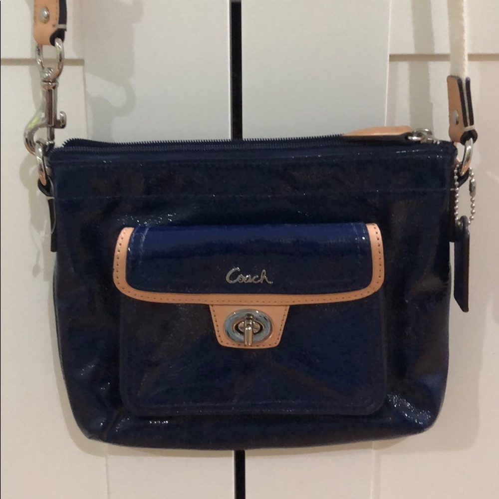 Coach Swingpack in blue patent leather